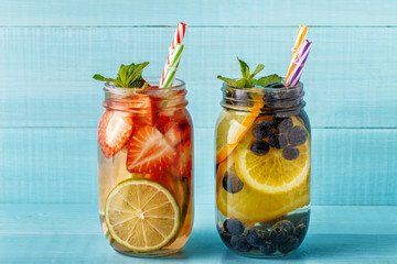 Detox fruit infused water. Refreshing summer homemade cocktail