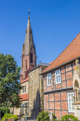 Fototapeta na wymiar St. Marien church and old house in Quakenbruck