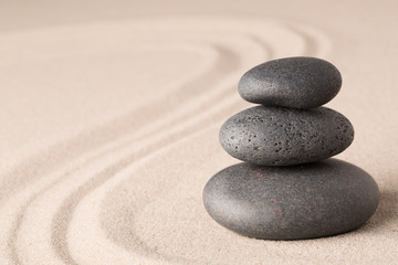 spa wellness hot stone therapy or zen meditation stones and sand for relaxation and concentration.