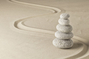 Fototapeta na wymiar stack of stones in Japanese zn meditation garden.