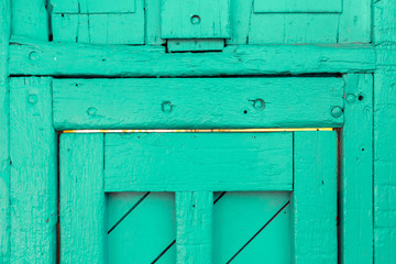 Rustic weathered wooden doors in Santa Fe, New Mexico