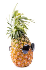 Trendy glasses summer pineapple wearing hipster style on white background