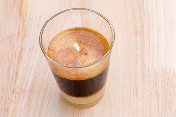 traditional Thai style hot coffee  on the wooden table.
