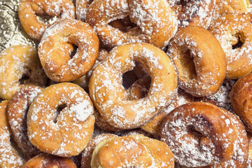 Obraz na płótnie Canvas fried donuts of Spain made with dough of flour , yeast, milk, eggs,oil, orange, anise and sugar