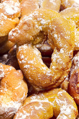 fried donuts of Spain made with dough of flour , yeast, milk, eggs,oil, orange, anise and sugar