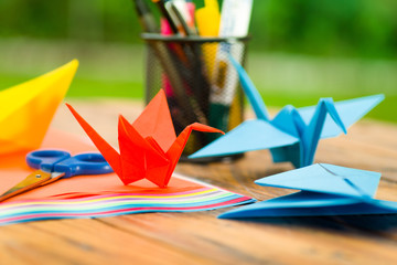Closeup shot of colorful papers to make origami art