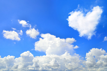 blue sky with hearts shape clouds. Beauty natural background