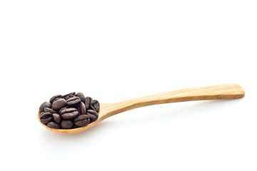 Coffee Beans in wooden spoon isolated on white background.