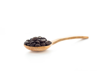 Coffee Beans in wooden spoon isolated on white background.