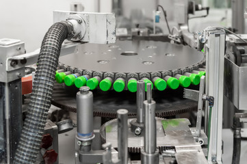 the machine prints on plastic lids. printing on plastic caps