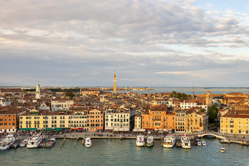 Obraz premium Venetian aerial view from the cruise ship which leaves the port of Venice (Venezia Terminal Passegeri Porto). Italy.