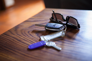Set of keys and sun glasses