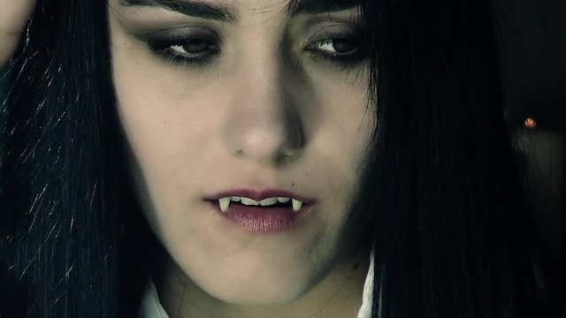 Beautiful female vampire feeling sad