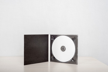 Listen to the music, white cd and black case