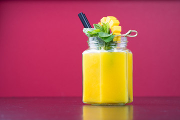 fresh fruit juice drink cocktail alcohol mint leaves garnish straw old style glass bar bartender shaker