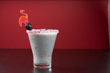 fresh fruit juice drink cocktail alcohol mint leaves garnish straw old style glass bar bartender shaker