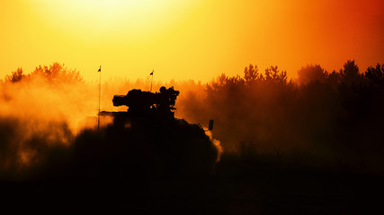 ARMORED INFANTRY FIGHTING VEHICLE - military vehicle in the forest at sunset