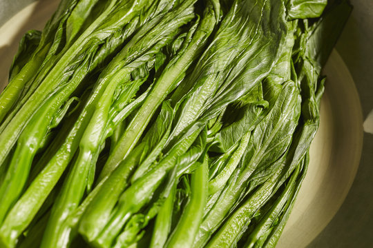 A Plate Of Cooked Chinese Broccoli