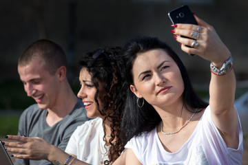 Friends taking selfie