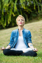 closed eyes woman in lotus position