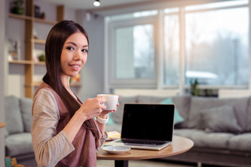 Young beautiful woman in cafe