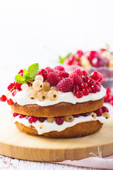 Obraz na płótnie Canvas Homemade layer cake with berries