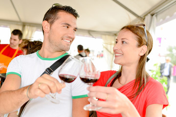 Couple tasting wine together