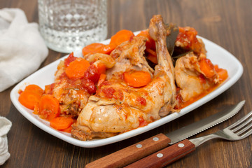 rabbit stew with carrot on white dish