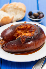 grilled poartuguese sausage farinheira on white plate