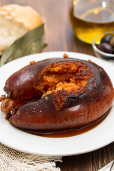 grilled poartuguese sausage farinheira on white plate