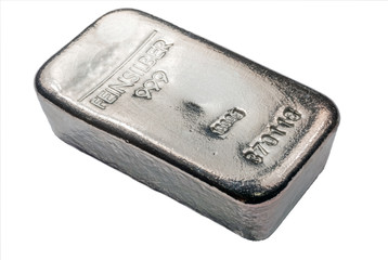Cast silver bar isolated on white background. The texture of the surface of the silver ingot.