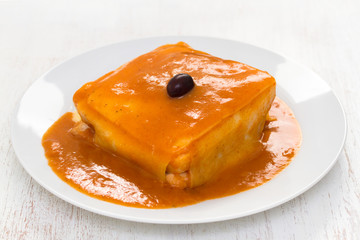 typical portuguese sandwich francesinha