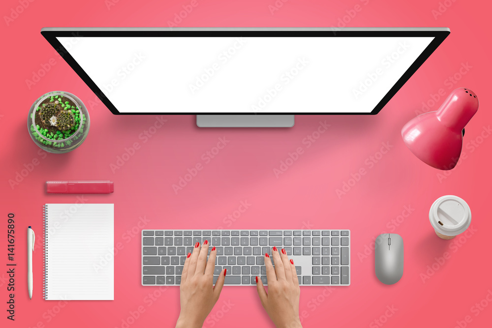 Poster red surface with computer monitor, keyboard and mouse. isolated blank screen for mockup. plant, lamp