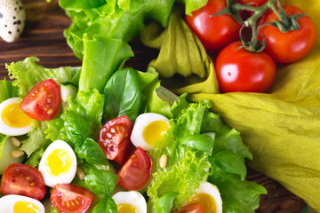 Letucce, cucumber, spinach, basil and quail eggs salad
