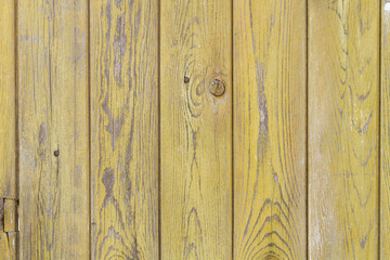 Obraz premium old planks with bright yellow paint
