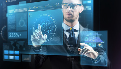 close up of businessman with virtual screens