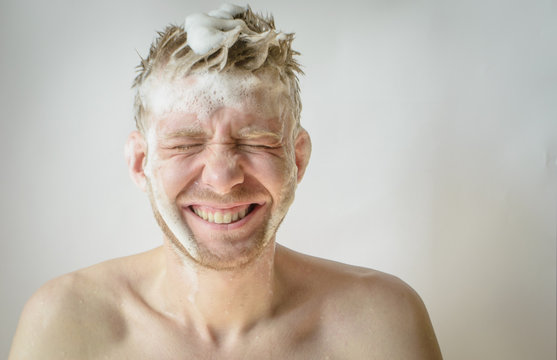 a man washes his head