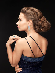 woman with diamond earrings
