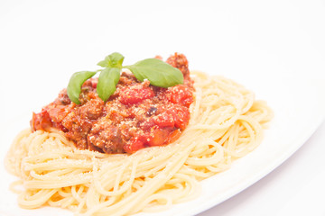Spaghetti bolognese on a white background