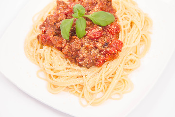 Spaghetti bolognese on a white background