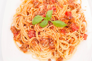 Spaghetti bolognese on a white background