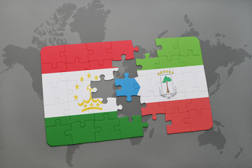 puzzle with the national flag of tajikistan and equatorial guinea on a world map