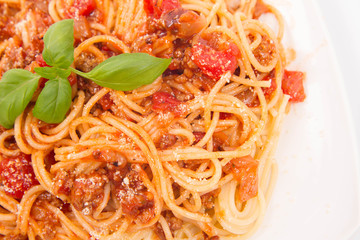 Spaghetti bolognese on a white background