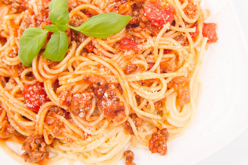 Spaghetti bolognese on a white background
