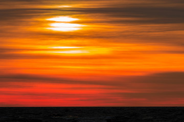 Fototapeta premium Golden sunset at Baltic sea, Riga, Latvia
