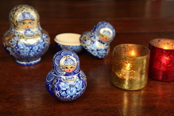 Traditional Russian dolls on wooden table