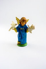 A small sculpture. Single figurines on a white background