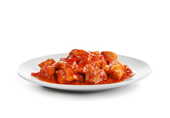 Plate with delicious chicken tikka masala isolated on white