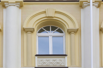 Arched window with decorated wall background
