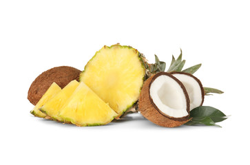 Fresh pineapple and coconuts on white background